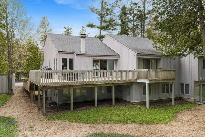 Enjoy Harbor Springs and Lake Michigan living from this highly - Beach Condo for sale in Harbor Springs, Michigan on Beachhouse.com