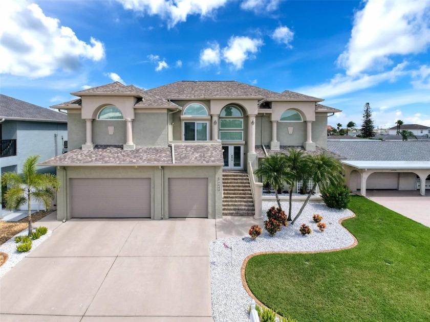 This amazing waterfront home is captivating from the moment you - Beach Home for sale in Hudson, Florida on Beachhouse.com