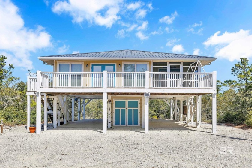 Discover your perfect coastal retreat in this beautifully - Beach Home for sale in Gulf Shores, Alabama on Beachhouse.com