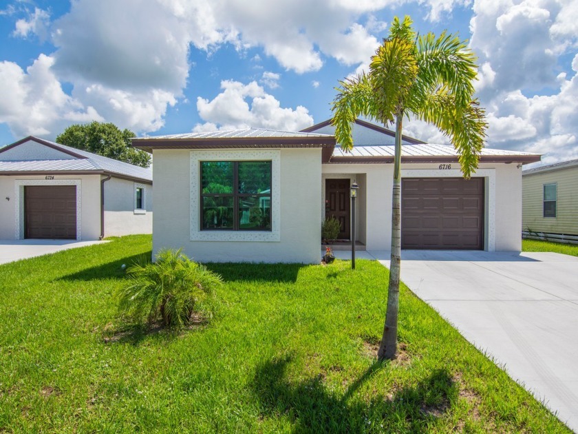 Step into this 2023 Newly Built home on a Land Lease for $831 a - Beach Home for sale in Fort Pierce, Florida on Beachhouse.com