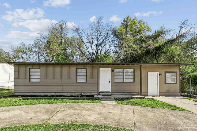 Step inside this freshly updated 3-bedroom home that offers both - Beach Home for sale in Pensacola, Florida on Beachhouse.com