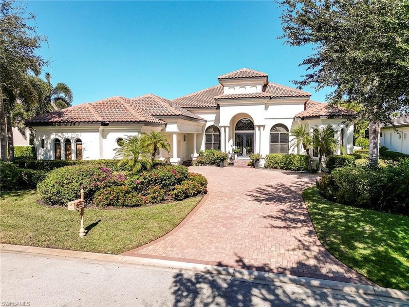 Overlooking the 18th hole of the renowned Shadow Wood Country - Beach Home for sale in Fort Myers, Florida on Beachhouse.com