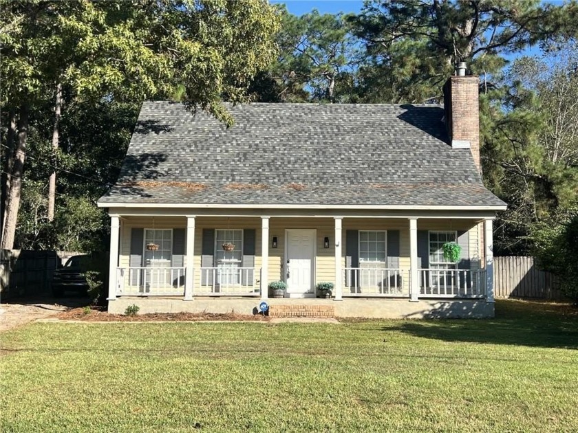 This delightful Creole-style residence offers a perfect blend of - Beach Home for sale in Daphne, Alabama on Beachhouse.com