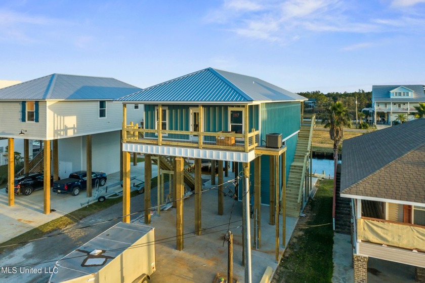 This waterfront home or camp on the MS Gulf Coast will check off - Beach Home for sale in Bay Saint Louis, Mississippi on Beachhouse.com