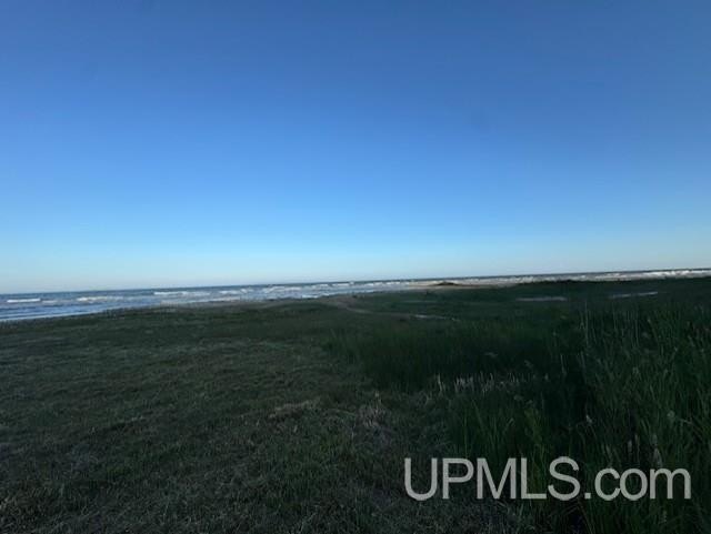 Gorgeous 100 feet of frontage on Lake Michigan with a rare sand - Beach Lot for sale in Rapid River, Michigan on Beachhouse.com