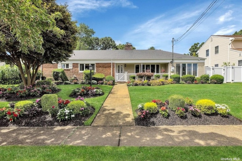 Welcome to Nassau Shores! This Sprawling 68 Ft Wide Ranch sits - Beach Home for sale in Massapequa, New York on Beachhouse.com