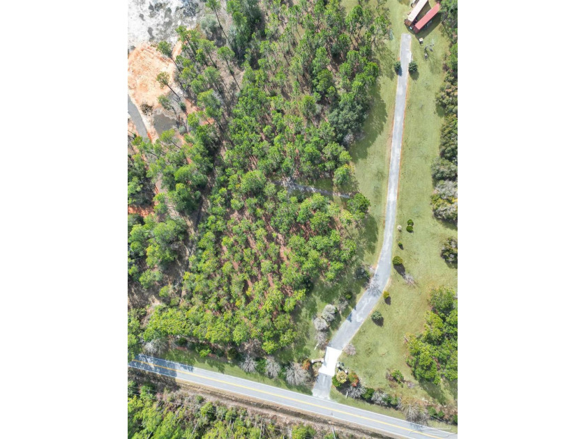 Tucked within an exclusive three-lot gated enclave, this 1 - Beach Lot for sale in Milton, Florida on Beachhouse.com