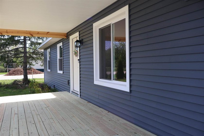 Completely remodeled one-level home offering easy living and - Beach Home for sale in Charlevoix, Michigan on Beachhouse.com