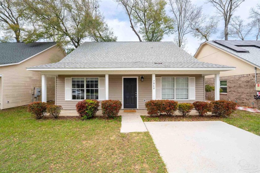 Welcome a charming two-story home offering comfort, modern - Beach Home for sale in Pensacola, Florida on Beachhouse.com