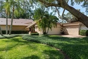 Welcome to your DREAM VILLA nestled in the sought after - Beach Home for sale in Palm Harbor, Florida on Beachhouse.com