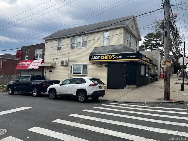 This mixed-use corner property offers a unique investment - Beach Lot for sale in College Point, New York on Beachhouse.com