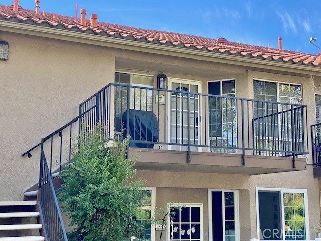 Perfectly positioned across from Lago Santa Margarita Beach Club - Beach Condo for sale in Rancho Santa Margarita, California on Beachhouse.com