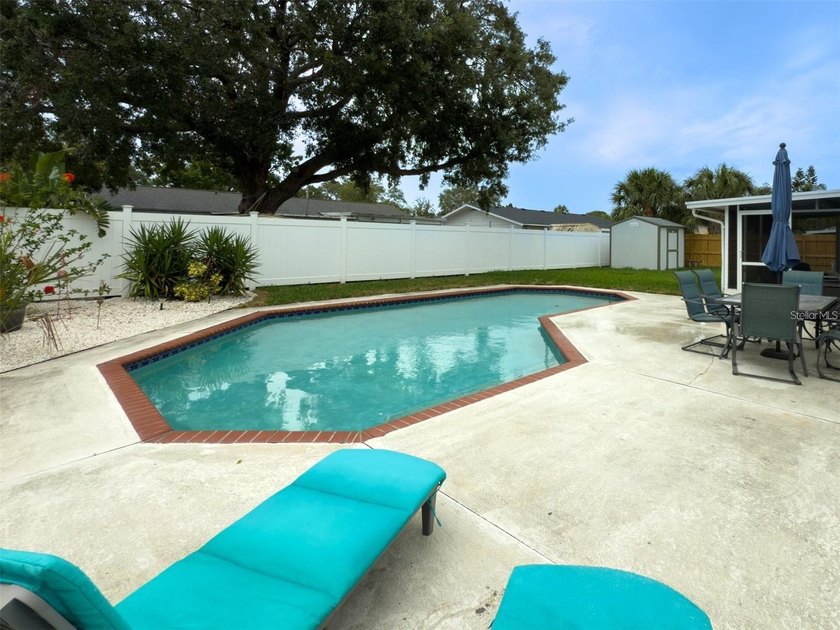 Welcome to a spacious 4-bedroom, 2.5-bath home located in the - Beach Home for sale in Tampa, Florida on Beachhouse.com