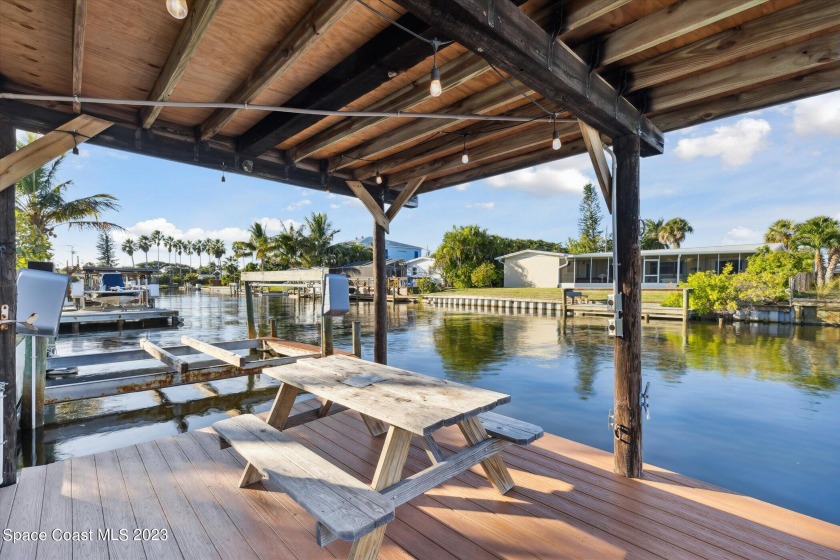 Experience coastal bliss in this 4BR/2BA oasis, boasting a - Beach Home for sale in Merritt Island, Florida on Beachhouse.com
