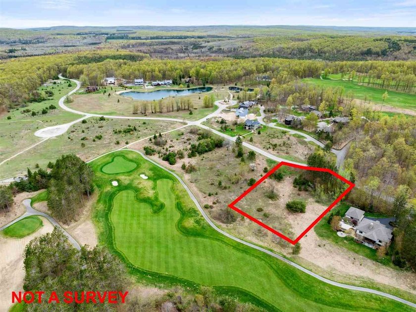 Enjoy panoramic golf course views overlooking the 12 hole at - Beach Lot for sale in Harbor Springs, Michigan on Beachhouse.com