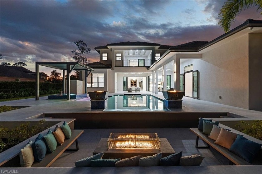 Discover an extraordinary new-construction estate, poised on - Beach Home for sale in Naples, Florida on Beachhouse.com