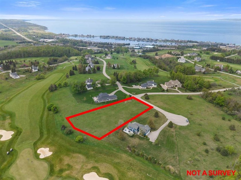 Tucked away on a quiet cul-de-sac within the Crooked Tree - Beach Lot for sale in Petoskey, Michigan on Beachhouse.com