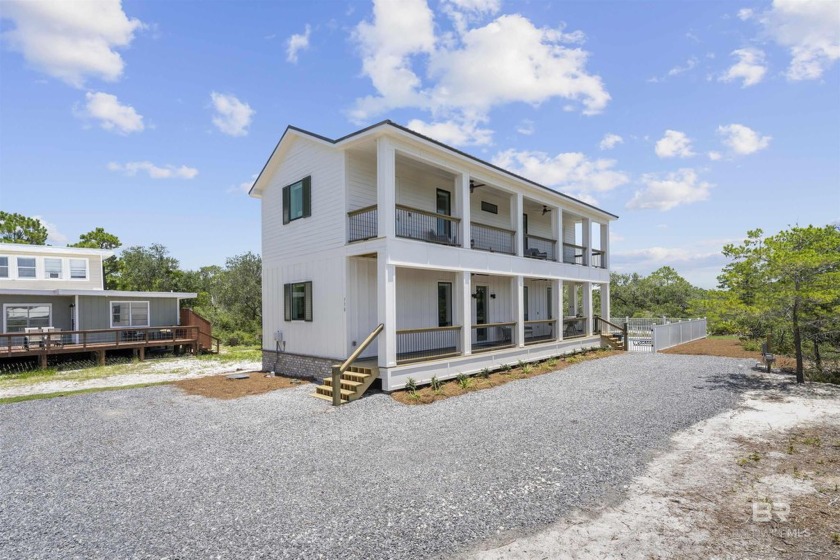 This new construction Fortified Gold beach house showcases an - Beach Home for sale in Gulf Shores, Alabama on Beachhouse.com