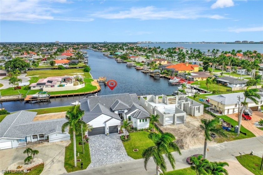 RARE EXTRA WIDE INTERSECTING CANAL VIEWS in the Yacht Club - Beach Home for sale in Cape Coral, Florida on Beachhouse.com