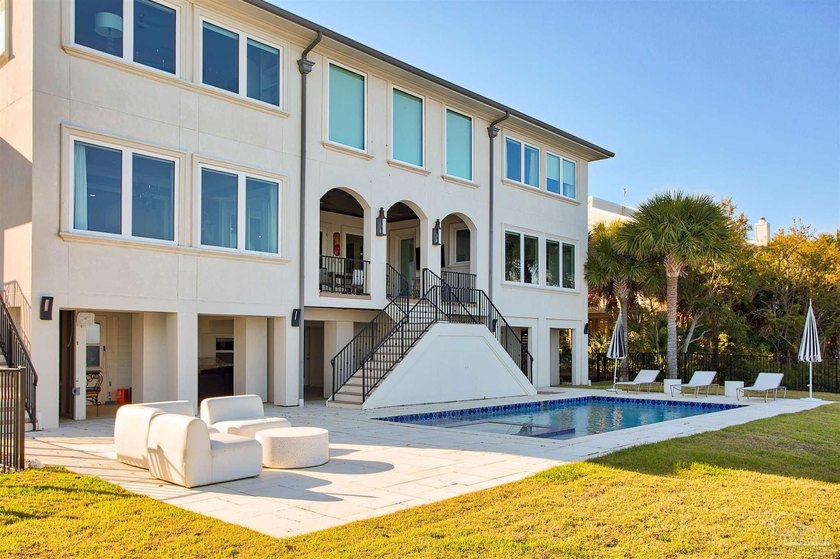This exquisite 5-bedroom, 4 and half-bathroom residence offers - Beach Home for sale in Gulf Breeze, Florida on Beachhouse.com