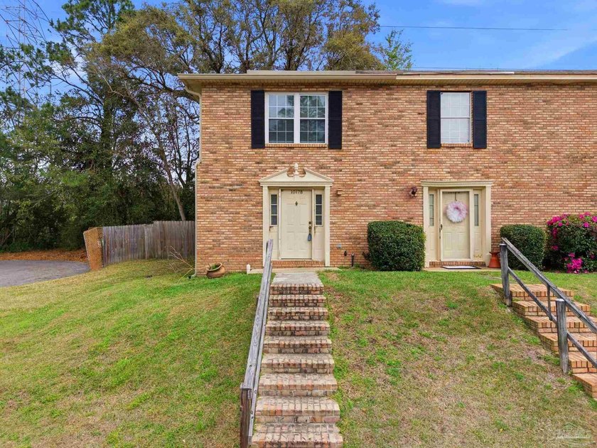 Tucked beneath mature trees on a quiet curve of the Foxborough - Beach Home for sale in Pensacola, Florida on Beachhouse.com