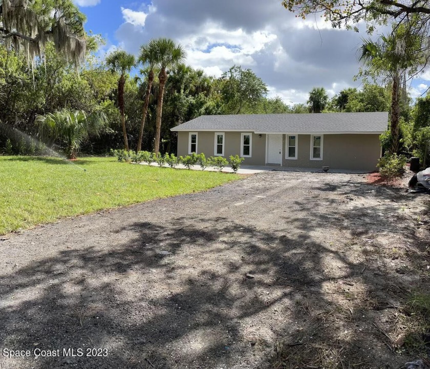 Come see this updated home on a large 1.24 acre north Meritt - Beach Home for sale in Merritt Island, Florida on Beachhouse.com