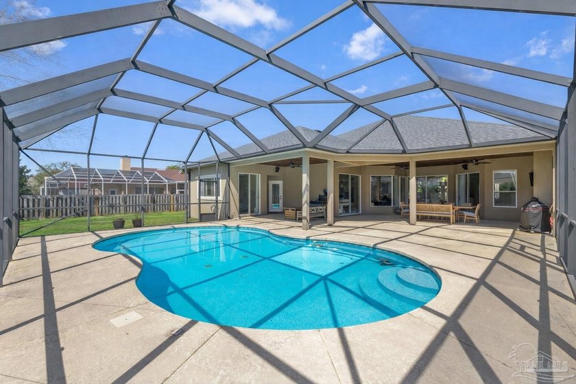 Welcome to this exceptional, fully remodeled home nestled on a - Beach Home for sale in Gulf Breeze, Florida on Beachhouse.com