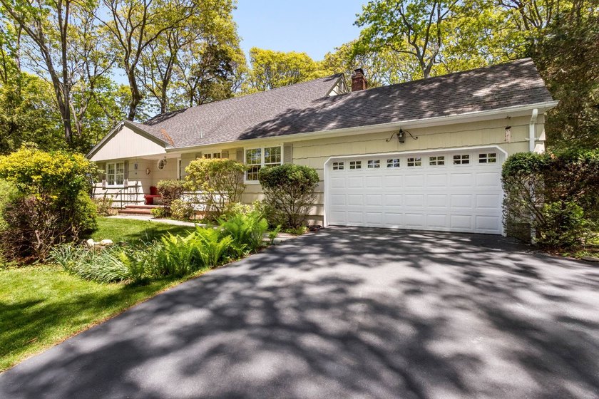 Tucked away on a quiet street in the heart of Miller Place, this - Beach Home for sale in Miller Place, New York on Beachhouse.com