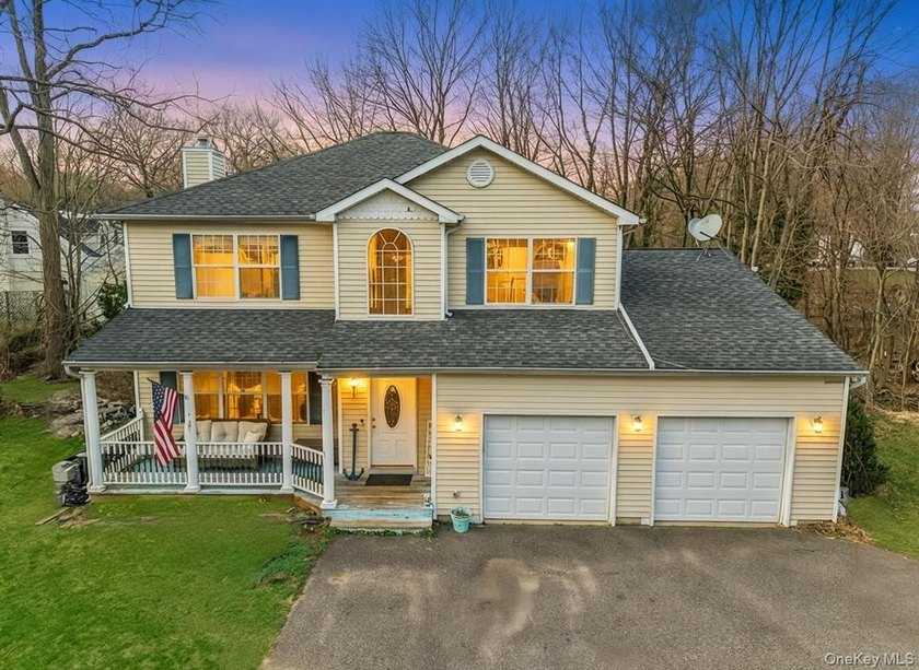 Welcome home to this oversized wonderful 4-bedroom, 2.5-bath - Beach Home for sale in Port Jefferson, New York on Beachhouse.com