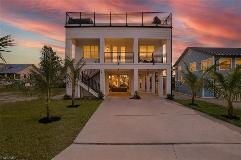 Welcome to this stunning, elevated NEW CONSTRUCTION home on Fort - Beach Home for sale in Fort Myers Beach, Florida on Beachhouse.com