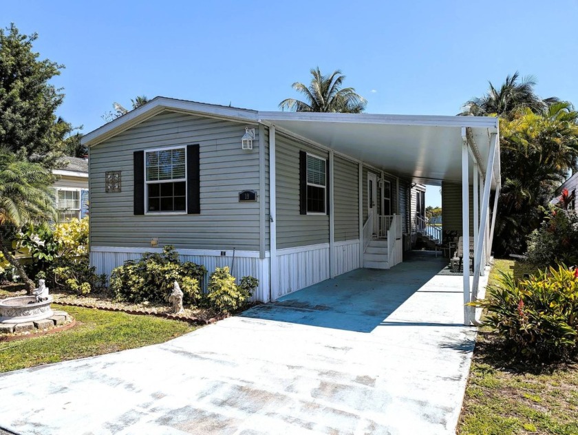 Experience serene lakefront living in this beautifully - Beach Home for sale in Fort Lauderdale, Florida on Beachhouse.com