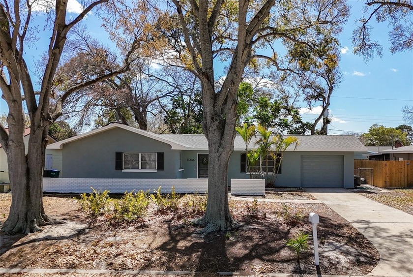 Welcome to this beautifully remodeled home on a quiet cul-de-sac - Beach Home for sale in Seminole, Florida on Beachhouse.com