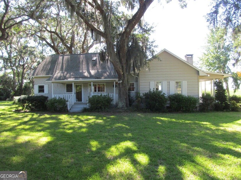 This home is on a beautiful marsh front site with oak trees and - Beach Home for sale in Townsend, Georgia on Beachhouse.com