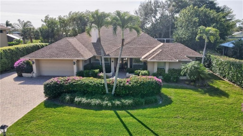 Nestled in the quiet and desirable section of the Woodlands - Beach Home for sale in Naples, Florida on Beachhouse.com