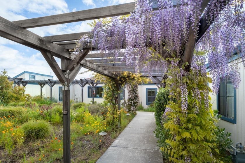 Come walk thru the gardens to this special Senior Affordable - Beach Condo for sale in Santa Cruz, California on Beachhouse.com