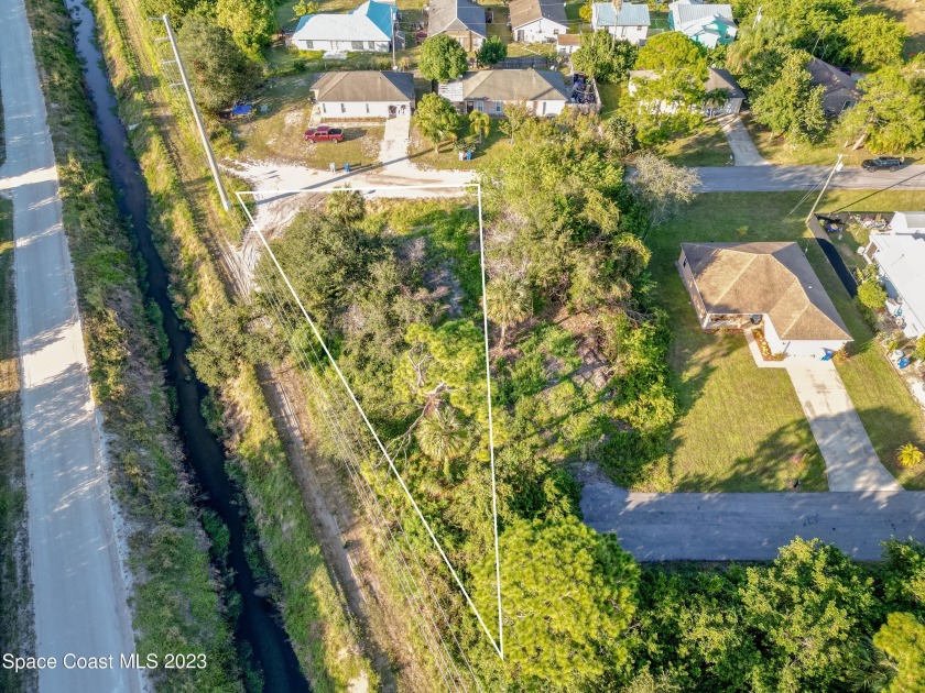 This expansive .34-acre corner lot is the perfect setting for - Beach Lot for sale in Vero Beach, Florida on Beachhouse.com