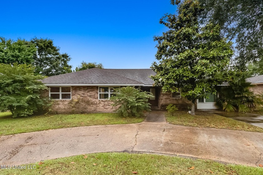 Lovely family home in the heart of Long Beach.  Open floor plan - Beach Home for sale in Long Beach, Mississippi on Beachhouse.com