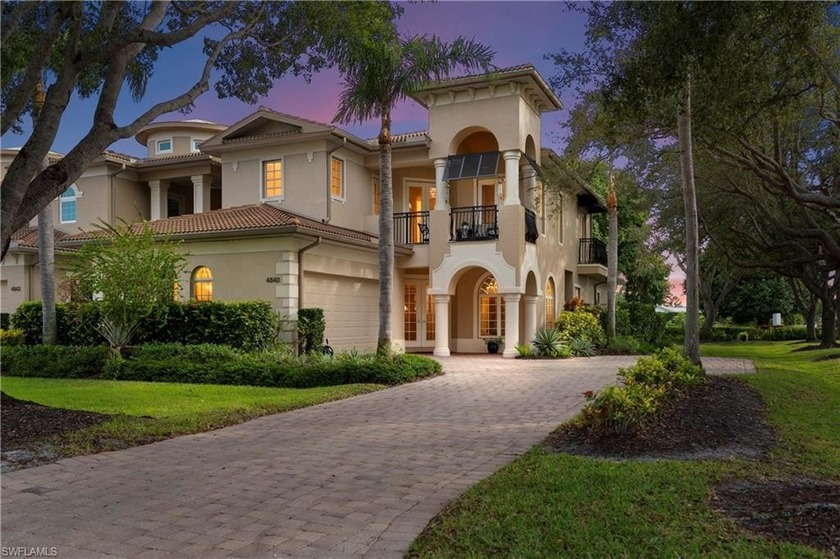 Experience refined Villa Pienza living in this elegant end-unit - Beach Home for sale in Naples, Florida on Beachhouse.com