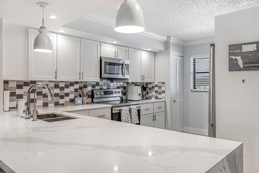 Welcome to 12926 Briarlake Dr #201 - a beautifully updated - Beach Condo for sale in Palm Beach Gardens, Florida on Beachhouse.com