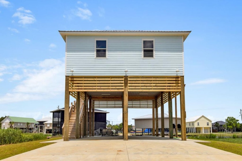 EXPERIENCE the ULTIMATE living in this STUNNING  3 bed/2bath - Beach Home for sale in Bay Saint Louis, Mississippi on Beachhouse.com