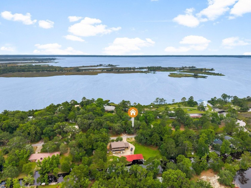 Breathtaking WATERFRONT PROPERTY! This one of a kind bay front - Beach Home for sale in Freeport, Florida on Beachhouse.com
