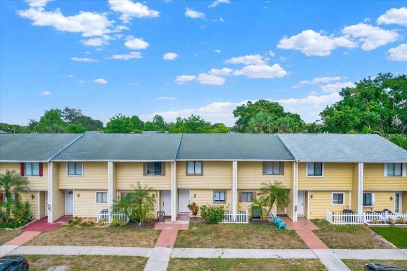 Welcome to this beautifully reimagined townhome tucked inside - Beach Condo for sale in Land O Lakes, Florida on Beachhouse.com