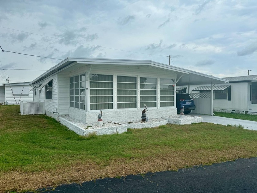 This two bed/two bath home is fully furnished and includes a - Beach Home for sale in Daytona Beach, Florida on Beachhouse.com