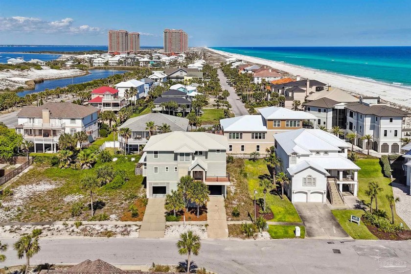 This impressive beach home truly has it all. From the moment you - Beach Home for sale in Pensacola Beach, Florida on Beachhouse.com