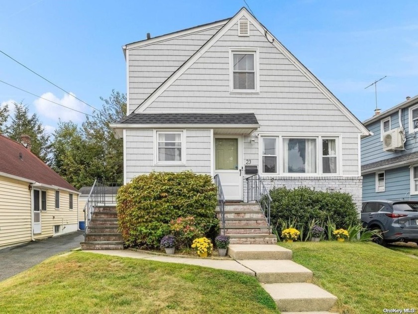 This beautifully updated Home is just a stone's throw away from - Beach Home for sale in Port Washington, New York on Beachhouse.com