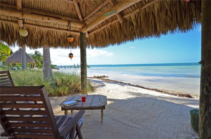 With stunning sunsets, sandy toes on the beach, and boat rides - Beach Condo for sale in Islamorada, Florida on Beachhouse.com