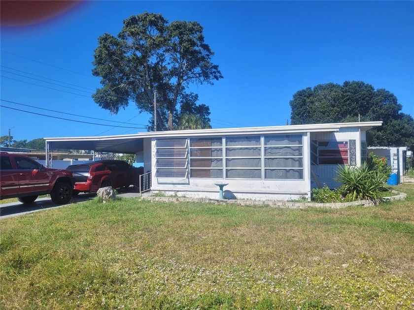 Investment Opportunity: Charming Property in Prime Location! - Beach Home for sale in Holiday, Florida on Beachhouse.com
