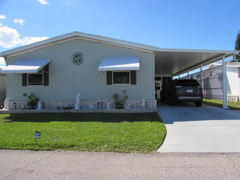 This lovely home has a split floor plan with two guest bedrooms - Beach Home for sale in Trinity, Florida on Beachhouse.com