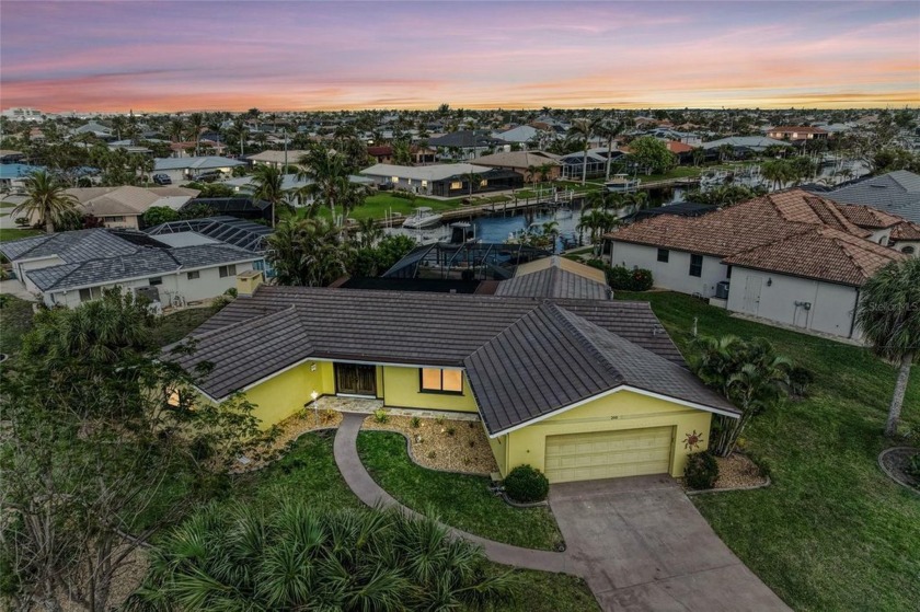 DO NOT MISS OUT ON THIS STUNNING WATERFRONT HOME WITH DOCK/LIFT - Beach Home for sale in Punta Gorda, Florida on Beachhouse.com