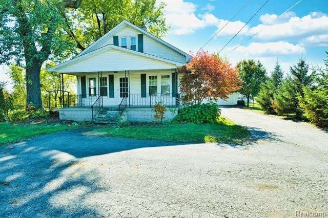 **Charming Farmhouse in Desirable Frenchtown Township with - Beach Home for sale in Monroe, Michigan on Beachhouse.com